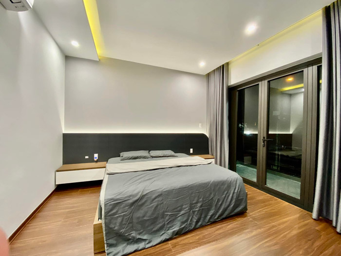 Giường lớn của phòng ngủ Giường lớn của phòng ngủ